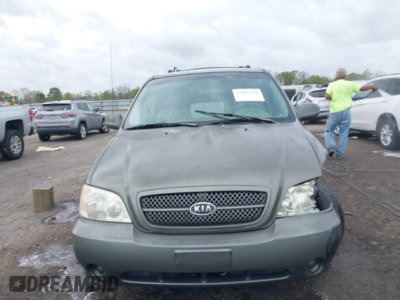 2005 Kia Sedona LX with VIN KNDUP132656734193, listed as a IAAI auction lot 41892342 with 91,768 mi miles. Bid and sale history available at carsss.com. Image 12.