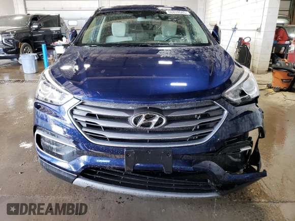 2018 Hyundai Santa Fe 2.4L z VIN 5XYZTDLB4JG553894, wystawiony jako Copart lot #56859585 z przebiegiem 97 313 mil mil oraz Szkoda całkowita • Salvage title. Historia ofert i sprzedaży dostępna na DreamBid. Obrazek 5.