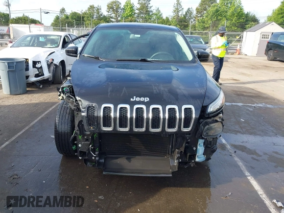 2014 Jeep Cherokee Sport with VIN 1C4PJLAB1EW221415, listed as a IAAI auction lot 42170364 with 182,813 mi miles and . Bid and sale history available at DreamBid. Image 13.