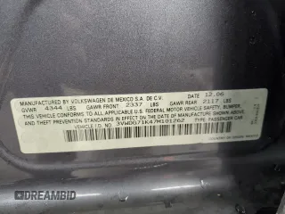 2007 Volkswagen Jetta z VIN 3VWDG71K47M101262, wystawiony jako Copart lot #51469695 z przebiegiem 241 174 mil mil oraz Szkoda całkowita • Salvage title. Historia ofert i sprzedaży dostępna na DreamBid. Obrazek 12.