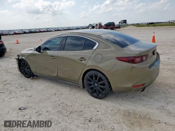 2024 Mazda 3 Carbon Edition with VIN 3MZBPBXYXRM409075, listed as a Copart auction lot 59189265 with 23,114 mi miles and Salvage title. Bid and sale history available at DreamBid. Image 2.