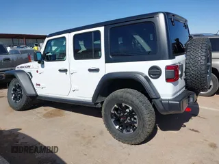 2025 Jeep Wrangler Rubicon with VIN 1C4PJXFN8SW527131, listed as a IAAI auction lot 41502676 with 1,051 mi miles and . Bid and sale history available at DreamBid. Image 14.