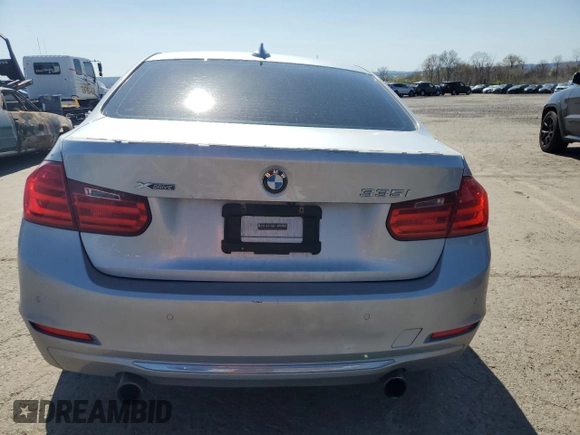 2014 BMW 3 Series 335i xDrive with VIN WBA3B9G57ENR91797, listed as a Copart auction lot 53724325 with 164,279 mi miles and Salvage Title. Bid and sale history available at DreamBid. Image 6.