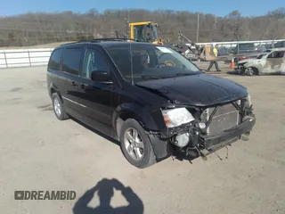 2009 Dodge Grand Caravan SXT z VIN 2D8HN54169R539294, wystawiony jako IAAI lot #41804315 z przebiegiem 175 090 mil mil oraz . Historia ofert i sprzedaży dostępna na DreamBid. Obrazek 1.