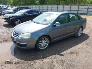 2008 Volkswagen Jetta Sedan Wolfsburg with VIN 3VWRJ71K58M185147, listed as a IAAI auction lot 42076387 with 193,621 mi miles. Bid and sale history available at carsss.com. Image 2.