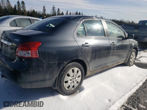2010 Toyota Yaris with VIN JTDBT4K33A1387279, listed as a Copart auction lot 51213405 with Not Provided miles and Salvage Title. Bid and sale history available at DreamBid. Image 3.