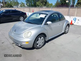 2001 Volkswagen Beetle GLS with VIN 3VWCD21C11M412672, listed as a IAAI auction lot 42336934 with 145,667 mi miles and . Bid and sale history available at DreamBid. Image 2.