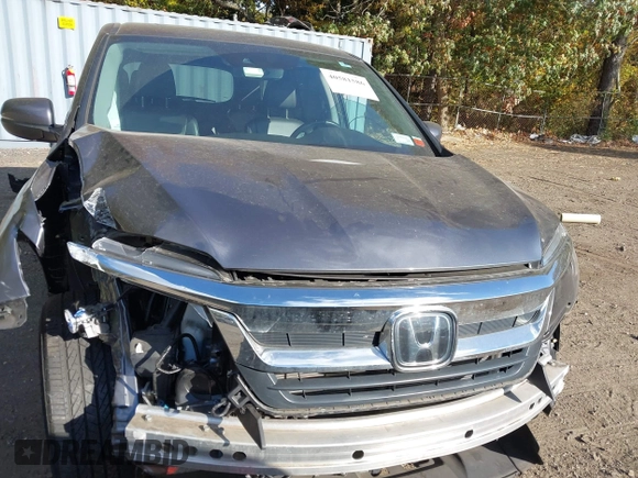 2020 Honda Pilot EX-L z VIN 5FNYF6H53LB069677, wystawiony jako IAAI lot #40581586 z przebiegiem 21 717 mil mil oraz . Historia ofert i sprzedaży dostępna na DreamBid. Obrazek 13.