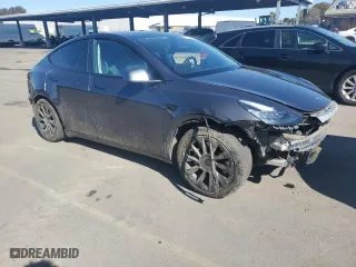 2021 Tesla Model Y Long Range with VIN 5YJYGAEE4MF160057, listed as a Copart auction lot 46144895 with 47,005 mi miles and Salvage Title. Bid and sale history available at carsss.com. Image 4.