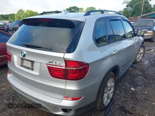2012 BMW X5 35i z VIN 5UXZV4C56CL749457, wystawiony jako IAAI lot #42250854 z przebiegiem 153 968 mil mil oraz . Historia ofert i sprzedaży dostępna na DreamBid. Obrazek 4.