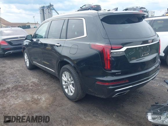 2024 Cadillac XT6 AWD Luxury z VIN 1GYKPBR49RZ723838, wystawiony jako IAAI lot #42346554 z przebiegiem 27 525 mil mil oraz . Historia ofert i sprzedaży dostępna na DreamBid. Obrazek 3.