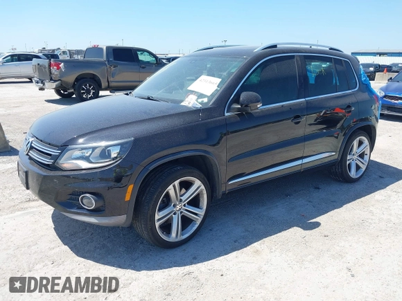 2014 Volkswagen Tiguan SEL with VIN WVGAV3AX4EW025339, listed as a IAAI auction lot 42313665 with 96,756 mi miles and . Bid and sale history available at DreamBid. Image 17.