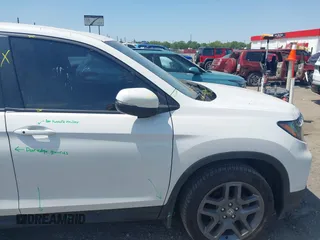 2023 Honda Passport EX-L z VIN 5FNYF8H57PB006499, wystawiony jako IAAI lot #42036371 z przebiegiem 51 404 mil mil oraz . Historia ofert i sprzedaży dostępna na DreamBid. Obrazek 22.