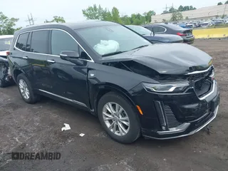 2024 Cadillac XT6 AWD Luxury z VIN 1GYKPBR49RZ723838, wystawiony jako IAAI lot #42346554 z przebiegiem 27 525 mil mil oraz . Historia ofert i sprzedaży dostępna na DreamBid. Obrazek 1.