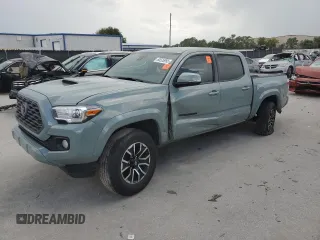 2023 Toyota Tacoma SR with VIN 3TMCZ5AN4PM584369, listed as a Copart auction lot 60525955 with 71,923 mi miles and Salvage title. Bid and sale history available at DreamBid. Image 1.