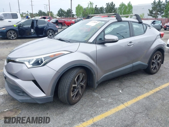 2018 Toyota C-HR XLE with VIN NMTKHMBX8JR032422, listed as a IAAI auction lot 42038240 with 132,553 mi miles and . Bid and sale history available at DreamBid. Image 2.