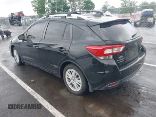 2018 Subaru Impreza Premium z VIN 4S3GTAD64J3705443, wystawiony jako IAAI lot #42304055 z przebiegiem 159 572 mil mil oraz . Historia ofert i sprzedaży dostępna na DreamBid. Obrazek 3.