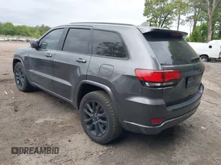 2018 Jeep Grand Cherokee Altitude z VIN 1C4RJEAG1JC344711, wystawiony jako IAAI lot #42293825 z przebiegiem 99 946 mil mil oraz . Historia ofert i sprzedaży dostępna na DreamBid. Obrazek 3.