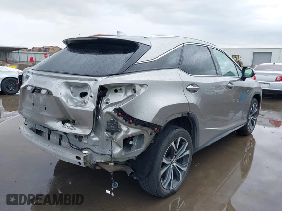 2020 Lexus RX with VIN 2T2HZMAA9LC178535, listed as a IAAI auction lot 41920764 with 119,377 mi miles. Bid and sale history available at carsss.com. Image 4.