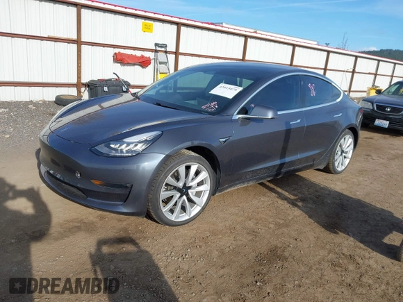 2020 Tesla Model 3 Long Range with VIN 5YJ3E1EB3LF801834, listed as a IAAI auction lot 42015079 with 47,793 mi miles. Bid and sale history available at carsss.com. Image 2.