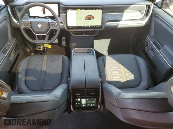 2024 Rivian R1T Adventure z VIN 7FCTGCAA3RN030346, wystawiony jako Copart lot #49440515 z przebiegiem 12 772 mil mil oraz Szkoda całkowita • Salvage title. Historia ofert i sprzedaży dostępna na DreamBid. Obrazek 8.
