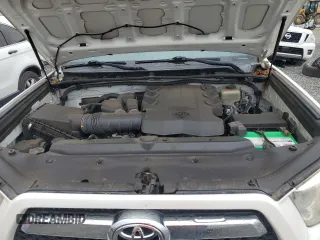 2013 Toyota 4Runner SR5 z VIN JTEZU5JR4D5057487, wystawiony jako Copart lot #51703755 z przebiegiem 119 883 mil mil oraz Szkoda całkowita • Salvage title. Historia ofert i sprzedaży dostępna na DreamBid. Obrazek 13.
