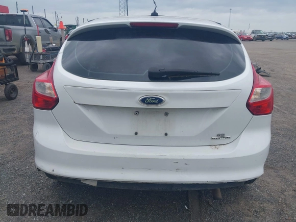 2014 Ford Focus SE z VIN 1FADP3K29EL233545, wystawiony jako IAAI lot #42282582 z przebiegiem 300 237 mil mil oraz . Historia ofert i sprzedaży dostępna na DreamBid. Obrazek 15.