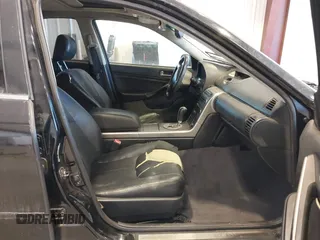 2003 Infiniti G35 w/Leather with VIN JNKCV51E53M304703, listed as a IAAI auction lot 41470321 with 227,894 mi miles. Bid and sale history available at carsss.com. Image 5.