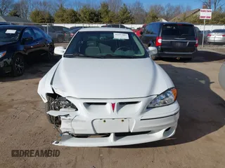 2001 Pontiac Grand Am GT with VIN 1G2NW52E11C244447, listed as a IAAI auction lot 41697883 with 81,983 mi miles. Bid and sale history available at carsss.com. Image 12.