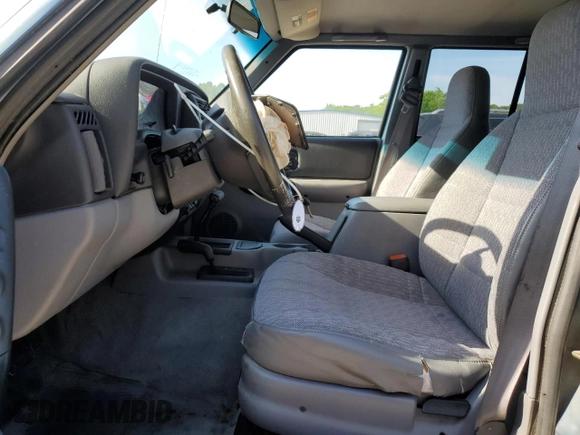 1998 Jeep Cherokee Sport with VIN 1J4FJ68S6WL283022, listed as a Copart auction lot 57451125 with 207,618 mi miles and Salvage title. Bid and sale history available at DreamBid. Image 7.