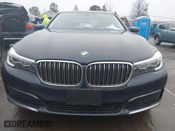 2019 BMW 7 Series 740i xDrive with VIN WBA7E4C52KGV70359, listed as a IAAI auction lot 41421504 with 55,734 mi miles and . Bid and sale history available at carsss.com. Image 12.