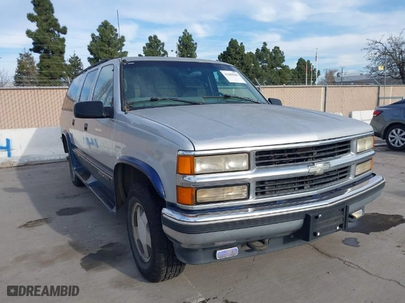 1997 Chevrolet Suburban with VIN 1GNFK16R2VJ365448, listed as a IAAI auction lot 41689906 with 228,151 mi miles. Bid and sale history available at carsss.com. Image 1.