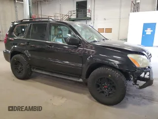 2004 Lexus GX 470 with VIN JTJBT20X740025411, listed as a Copart auction lot 55363145 with 329,164 mi miles and Salvage Title. Bid and sale history available at DreamBid. Image 4.