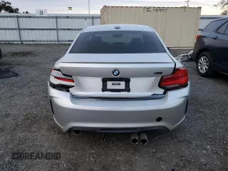 2018 BMW M2 z VIN WBS1J5C55JVA12540, wystawiony jako Copart lot #39402763 z przebiegiem 23 339 mil mil oraz . Historia ofert i sprzedaży dostępna na DreamBid. Obrazek 6.