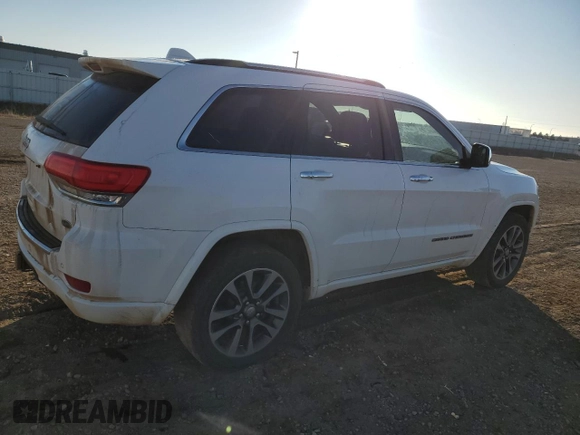 2017 Jeep Grand Cherokee Overland with VIN 1C4RJFCG3HC675125, listed as a Copart auction lot 50142865 with 113,819 mi miles and Salvage Title. Bid and sale history available at carsss.com. Image 3.