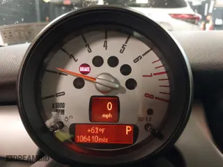 2013 MINI Cooper Hardtop with VIN WMWSU3C55DT679450, listed as a IAAI auction lot 41891583 with 106,410 mi miles. Bid and sale history available at carsss.com. Image 7.