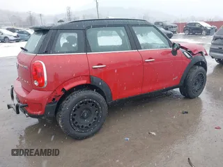 2014 MINI Countryman S z VIN WMWZC5C57EWM17149, wystawiony jako IAAI lot #41246831 z przebiegiem 112 369 mil mil oraz . Historia ofert i sprzedaży dostępna na DreamBid. Obrazek 4.
