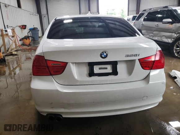2009 BMW 3 Series 328i xDrive with VIN WBAPK53579A513151, listed as a Copart auction lot 63041215 with 164,631 mi miles and Salvage title. Bid and sale history available at DreamBid. Image 6.