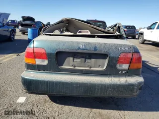 1996 Honda Civic LX "O" w/Air with VIN 2HGEJ6670TH544994, listed as a Copart auction lot 77412644 with 137,141 mi miles and Salvage Title. Bid and sale history available at carsss.com. Image 6.