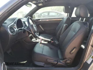 2014 Volkswagen Beetle 2.5L w/Sun with VIN 3VWJP7AT4EM612608, listed as a Copart auction lot 74679104 with 141,559 mi miles and Salvage Title. Bid and sale history available at DreamBid. Image 7.