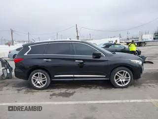 2013 Infiniti JX35 with VIN 5N1AL0MN7DC310972, listed as a IAAI auction lot 41859376 with 117,679 mi miles. Bid and sale history available at carsss.com. Image 13.