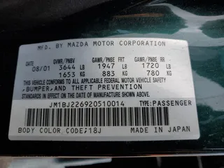 2002 Mazda Protege LX z VIN JM1BJ226920510014, wystawiony jako Copart lot #59285995 z przebiegiem 235 652 mil mil oraz Szkoda całkowita • Salvage title. Historia ofert i sprzedaży dostępna na DreamBid. Obrazek 12.