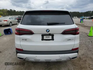 2022 BMW X5 xDrive40i with VIN 5UXCR6C01N9M26766, listed as a Copart auction lot 50990865 with 24,036 mi miles and Salvage Title. Bid and sale history available at DreamBid. Image 6.