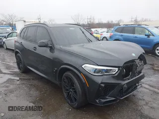 2021 BMW X5 M z VIN 5YMJU0C09M9F80557, wystawiony jako IAAI lot #41074068 z przebiegiem 47 671 mil mil oraz . Historia ofert i sprzedaży dostępna na DreamBid. Obrazek 1.