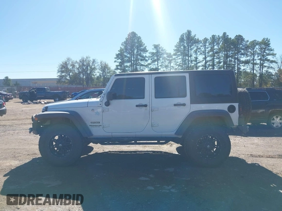 2017 Jeep Wrangler Unlimited Sport with VIN 1C4BJWDG4HL502861, listed as a IAAI auction lot 40895010 with 62,970 mi miles. Bid and sale history available at carsss.com. Image 14.