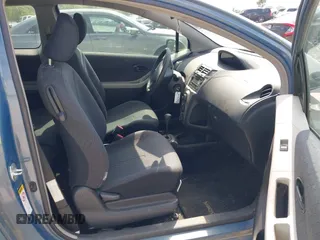 2009 Toyota Yaris with VIN JTDJT903X95227092, listed as a IAAI auction lot 42018166 with 120,605 mi miles. Bid and sale history available at carsss.com. Image 5.