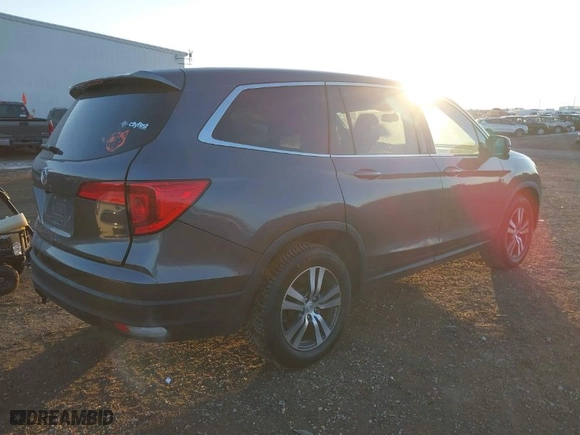 2017 Honda Pilot EX-L with VIN 5FNYF5H56HB020703, listed as a IAAI auction lot 41366342 with 96,618 mi miles. Bid and sale history available at carsss.com. Image 4.