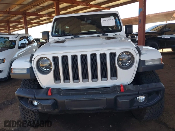 2020 Jeep Wrangler Unlimited Rubicon with VIN 1C4HJXFGXLW107958, listed as a IAAI auction lot 42058477 with 69,951 mi miles and . Bid and sale history available at DreamBid. Image 12.