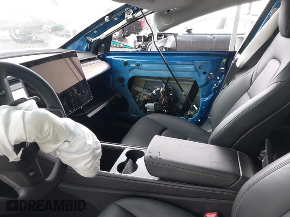 2023 Tesla Model 3 z VIN 5YJ3E1EA9PF566224, wystawiony jako IAAI lot #42292218 z przebiegiem 22 730 mil mil oraz . Historia ofert i sprzedaży dostępna na DreamBid. Obrazek 5.