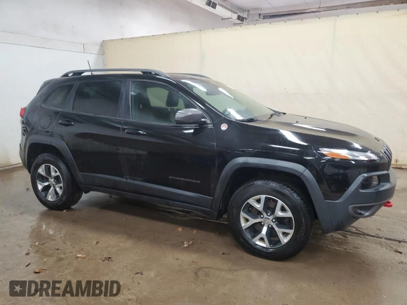 2017 Jeep Cherokee Trailhawk with VIN 1C4PJMBS8HW545440, listed as a Copart auction lot 61485375 with 202,369 mi miles and Clean title. Bid and sale history available at DreamBid. Image 4.